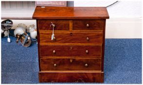 19th Century Mahogany Miniature Chest of Drawers, comprising two short drawers over three long