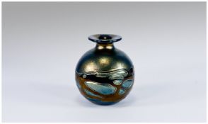 Phoenician Glass Globe Shaped Iridescent Small Vase, the lower part decorated with blue/gold lustre