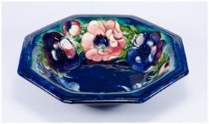 Moorcroft Anemone Pattern Octagonal Bowl, on a deep blue ground with a `halo` of turquoise around