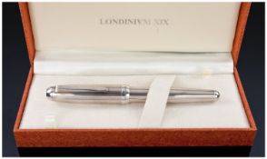 A Good Quality Italian Silver Rollerball Pen in its fitted case and with leaflet. Fine striped body