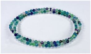 Double Strand Necklace of Faceted Fluorite in shades of green, purple and blue, the gemstone from