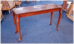 Modern Oak Veneered Side Table, oak quartered top, raised on a mahogany frame, with cabriole legs,