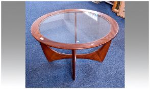 G Plan Glass Topped Teak Coffee Table, of circular form, the legs united by cross-stretchers,