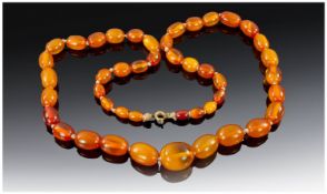 Amber Necklace, graduated, knotted; 23 inches long, 26.6 grams