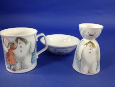 Royal Doulton, The Snowman. Build a snowman egg cup and plate, boxed, together with Royal Doulton