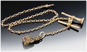 9ct Gold Vintage Chain & Seal with base metal charm figure. Stamped 9ct. Gold weight 13.6 grams.