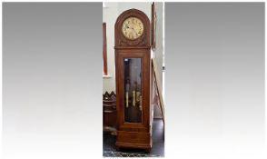 Early 20th Century Oak Longcase Clock, circa 1920, with brass dial, with black Arabic numerals, the