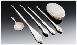 Small Collection of Silver, including button hooks, late 19th / early 20th century, together with a