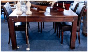 Large Teak Dining Table, from the `Raft Collection`, with square top, raised on square legs.