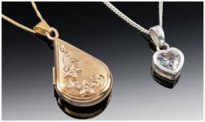 9ct Gold Fine Link Chain And Pendant Locket, Together With A Silver Pendant And Chain, Both Boxed.