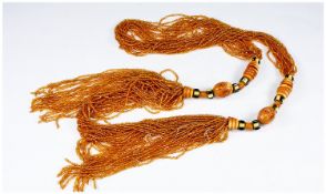 Flapper Style 1920`s Seed Bead Necklace, multiple strands of yellow seed beads pulled together by