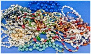 Large Collection of Beads, including pearls and amber coloured beads.