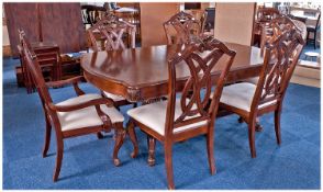 Large Dining Table and Six Matching Chairs, the table of double pedestal form, each pedestal raised