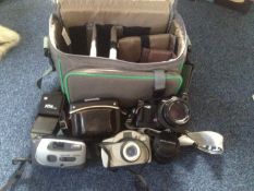 Collection of Photography Equipment including cameras and lenses in Case. Cameras include Agfa