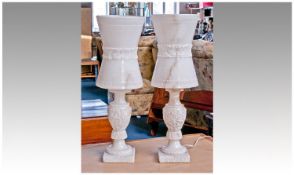 Pair of Contemporary Limestone Table Lamps, with solid limestone shades, of waisted form, raised on