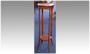 Edwardian Mahogany Two-Tier Plant Stand, circular form, the top with double boxwood stringing, the