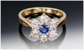 18ct Gold Diamond & Sapphire Cluster Ring, Set With A Central Round Cut Sapphire Surrounded By 6