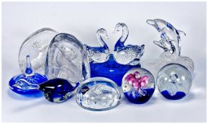 Collection of Various Paperweights, including two moulded paperweights, bird figure, dolphin, swan
