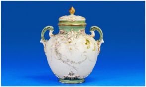 Royal Worcester Lidded two handled vase, with raised floral decoration. Date 1897. Restoration to