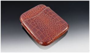 A Vintage Crocodile Skin - Cigar Case of Good Quality and Condition. Size 2.25 x 4.75 inches.