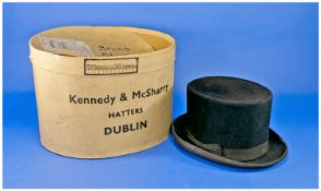 Black Top Hat, large size, manufactured by G.A.Dunn & Co., London, cream lining with buff leather