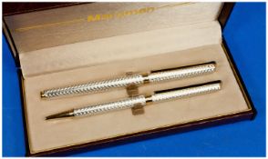 Maruman Boxed Set of a Silver and Gold Pen Set comprises ball point pen and propelling pencil. As