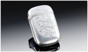 A Continental Vesta Case Of Rounded Vertical Rectangular Form. Floral engraved decoration to the