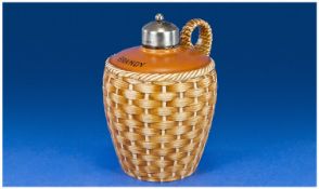 A Fine Taylor and Tunnicliffe Silver Topped Basket Weave Brandy Flagon. Fine ceramic liqueur jug