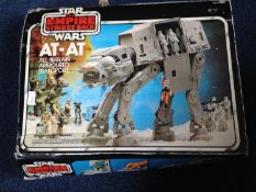 Collection of Star Wars Figures comprising AT-AT, B Wing Fighter, The Interceptor, Ewok Villiage,