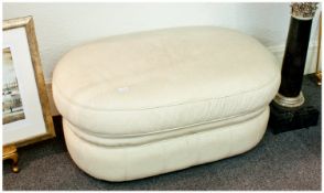 Small Contemporary Cream Leather Upholstered Pouffe, measuring 17 inches high, 40 wide and 26 deep.