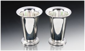 A Pair Of Silver Wine Goblets. Trumpet shaped with flared rim and a spreading foot which is