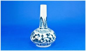 A Chinese Blue and White Porcelain Bottle Vase, heavily potted and decorated in the Ming style,