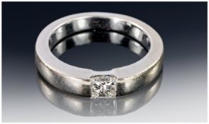 Ladies 18ct White Gold set Diamond Solitaire with a Princess cut Diamond in edge to edge setting.