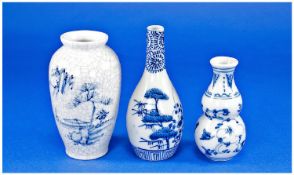 Two Miniature Blue and White Chinese Porcelain Vases, one of baluster form, the other of double -