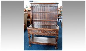 Small Oak Dresser with Rack, the rack with carved cornice and two shelves below, the base fitted