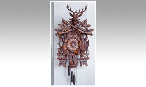 Black Forrest - Hunting Theme. Finely Hand Carved - Musical Cuckoo Clock with 36 note melody, at