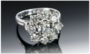 18ct White Gold Diamond Cluster Ring with Flowerhead Setting. The Centre Diamond surrounded by 8