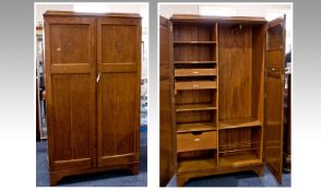 Early 20th Century Oak Gentleman`s Compactum Wardrobe, circa 1925, fitted with two panelled doors,