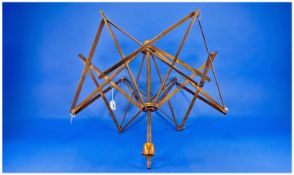 Late 19th Century Wooden Wool Winder of collapsible criss-cross form, around a central stem, with