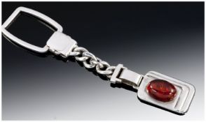 A Stylish Italian Sterling Silver Key Ring with an art deco style fob on a chain link set with a