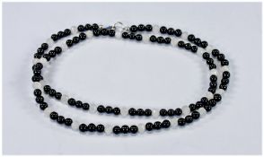 Black Onyx and Rainbow Moonstone Necklace, the faceted moonstones, sourced from Sri Lanka,