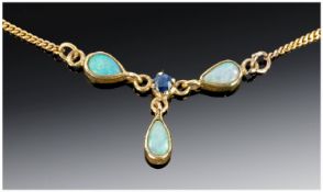 9ct Gold Necklace Set With Three Pear Shaped Opals And A Round Sapphire. Hallmarked.