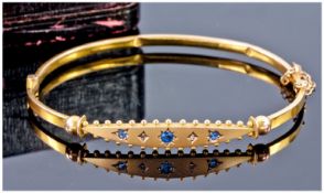 9ct Gold Hinged Bangle, The Front Set With Three Sapphires Between Two Diamond Chips, Complete With