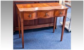 Bevan Funnell Mahogany Side Table, of triple bow fronted form, fitted with three drawers, raised on