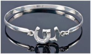 Silver Bangle, The Fastener In The Form Of a Double Horse Shoe.