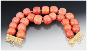 Tibetan 19th Century Natural Coral Two Row Bracelet with high carat gold clasps - marked; excellent