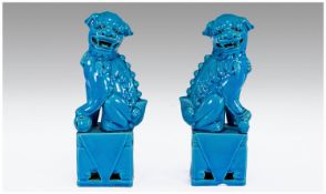 Chinese Fine Pair Of Turquoise Glazed Temple Dogs. Circa 1920s. Each standing 8.5`` in height.