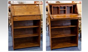 Small Early 20th Century Oak Bureau, the fall front opening to reveal pigeon holes, the fall with