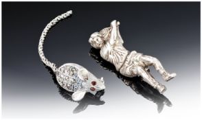 Two Silver Brooches, Modelled In The Form Of a Mouse And a Tennis Player.