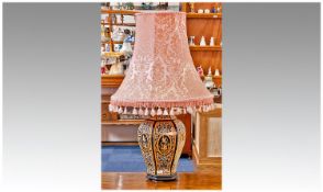 Modern Decorative Table Lamp, oriental style base, black ground with peach coloured fringed shade.
